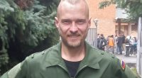 Alexei Oleinik, a Russian porn star, in military uniform.