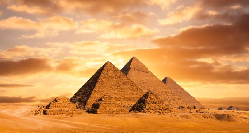 The Pyramids of Giza at sunset.