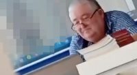 Physics teacher watching pornography on his laptop during class.