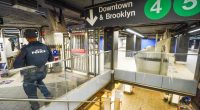 Shouting maniac hurls bottle at woman, 67, in random on subway assault as victim rails about attacker's lengthy rap sheet