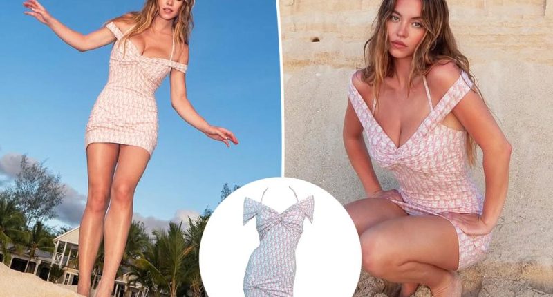 Sydney Sweeney models pinup-style minidress in smiley beach snaps