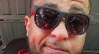 Close-up of a man wearing sunglasses.