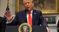 President Trump speaking at a podium.