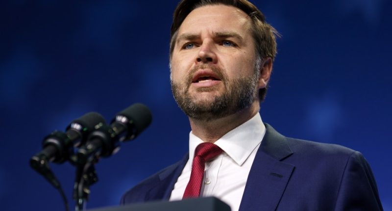 Vice President JD Vance speaking at a podium.