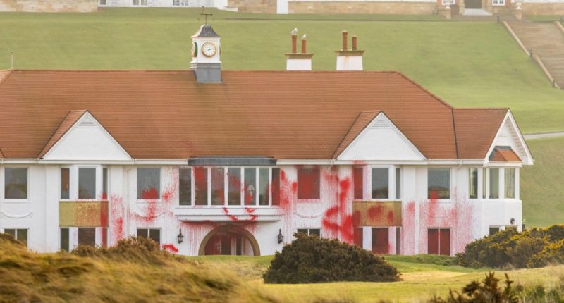 Red paint splattered on a clubhouse.