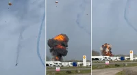 Two military jets collide in midair stunt, crash to ground in fiery explosion