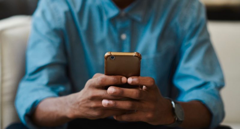 Person using a smartphone.