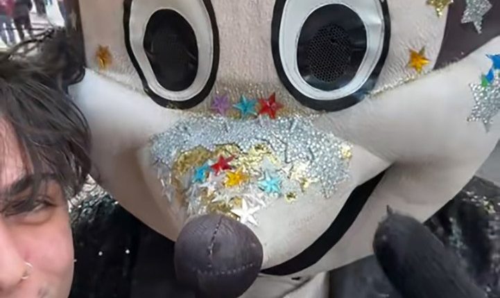 A photo of a person with a Mickey Mouse mascot who allegedly extorted money in Naples, Italy.