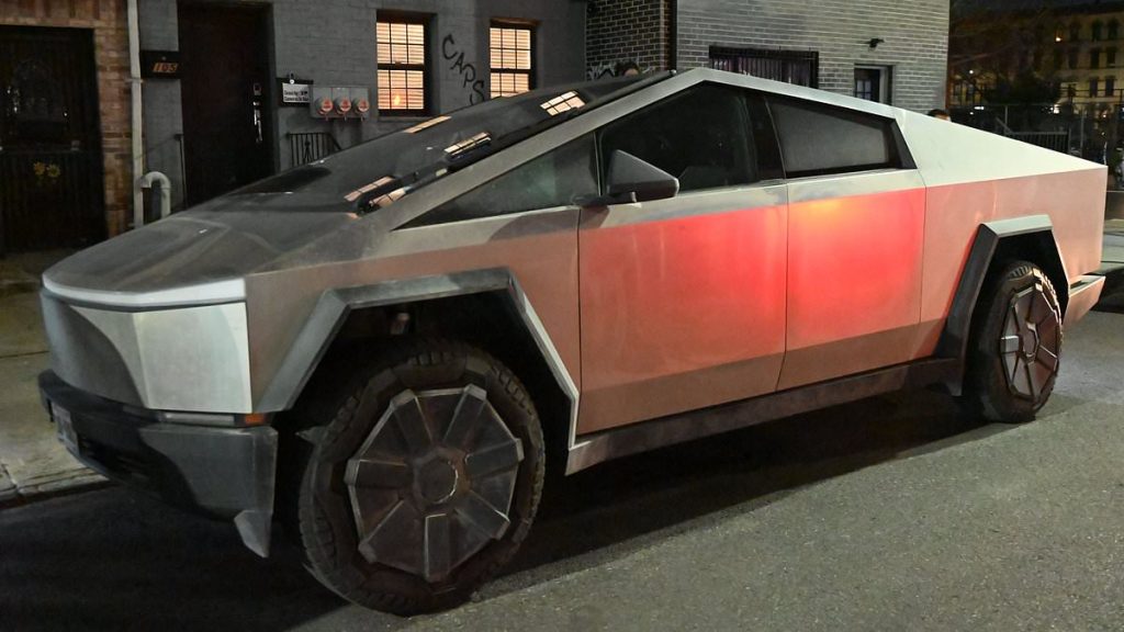 Vandals make crucial mistake while scrawling hate symbol on Tesla