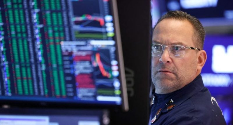 Wall Street tumbles on worries about slower economy, inflation