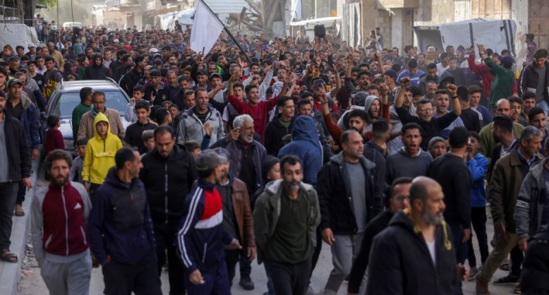 Large group of Palestinians protesting in Gaza.
