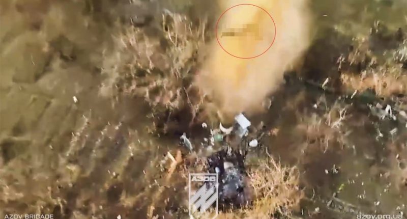 Aerial footage of a drone strike hitting a Russian soldier.