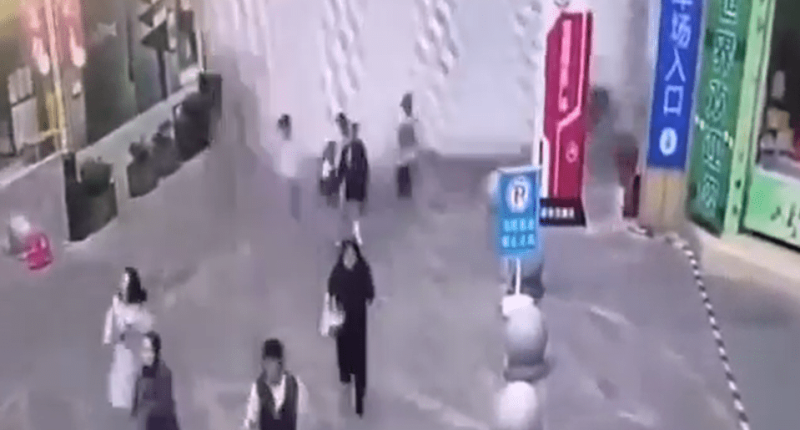 People walking in a city street.