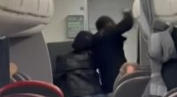 A passenger assaulting flight attendants on an airplane.
