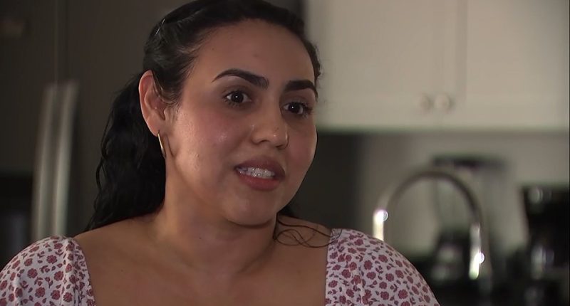 Woman learning about home foreclosure.