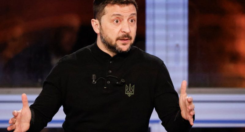 Volodymyr Zelensky addressing journalists.