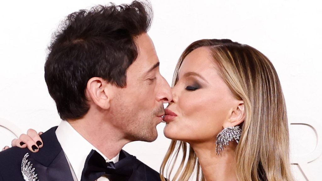 Adrien Brody plants a kiss on Georgina Chapman at Oscars 2025