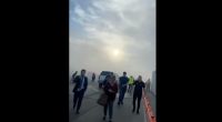 Aircraft catches fire after landing in Denver, sending passengers onto wing as smoke engulfs plane