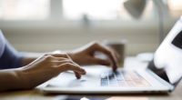 Woman using her laptop for working from home