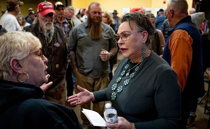 Angst pervades a pair of Republican town halls — one in Trump country, the other in a swing state