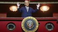 President Donald Trump stands in the presidential box as he tours the John F. Kennedy Center for the Performing Arts in Washington.