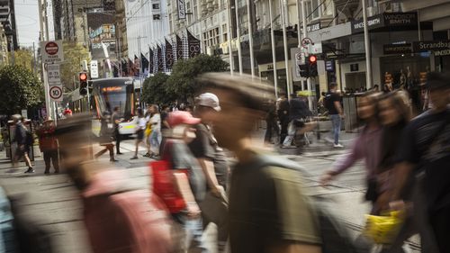 Pedestrians on Bourke Street in Melbourne.
