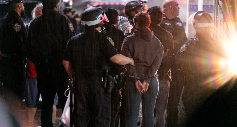 Columbia University says it expelled some students who seized building last year