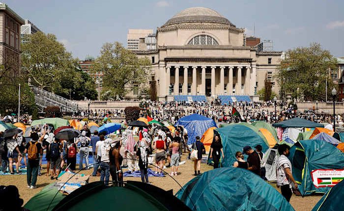 Columbia University's interim president steps down and returns to former post