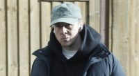 Danny Jones looks downcast as he steps out after his wife 'left home'