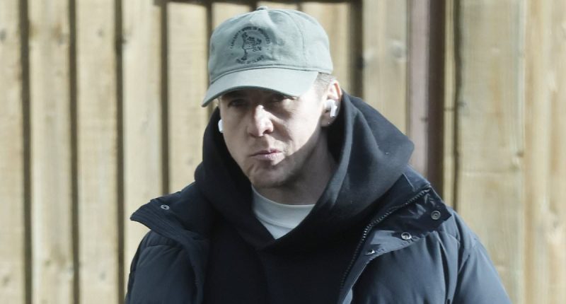 Danny Jones looks downcast as he steps out after his wife 'left home'