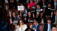 Democrats disrupt, protest and wear pained expressions for Trump’s speech