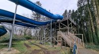 'Devastated' locals blame new 'tourism tax' for sudden closure of huge theme park after four decades - as new photos reveal rides being taken apart