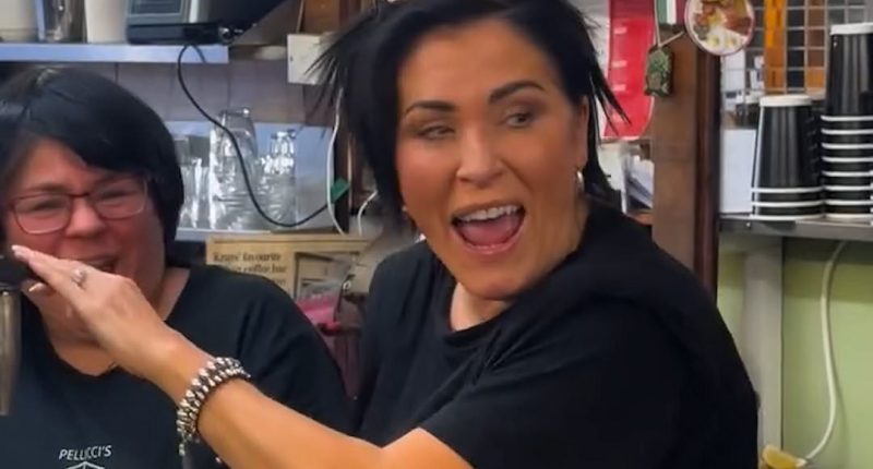 EastEnders star Jessie Wallace pours coffees at famous London cafe