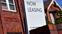 A "now leasing" sign at a property listed for rent in Sydney.