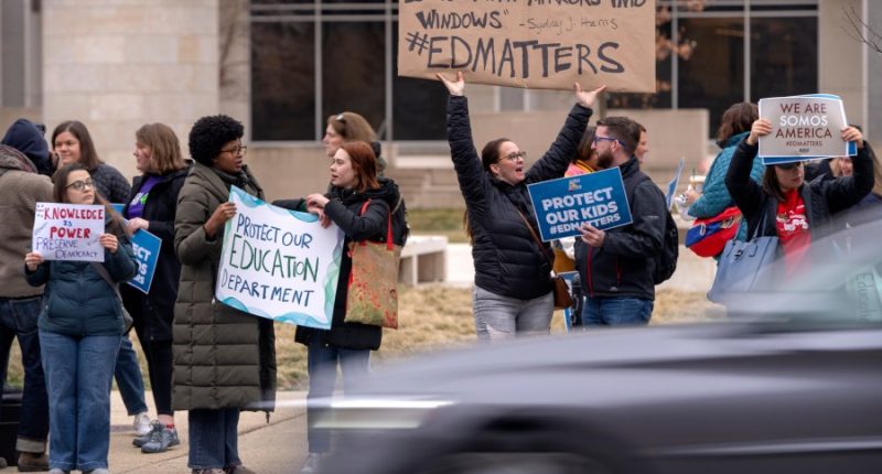 Fired Department of Education employees clean out desks