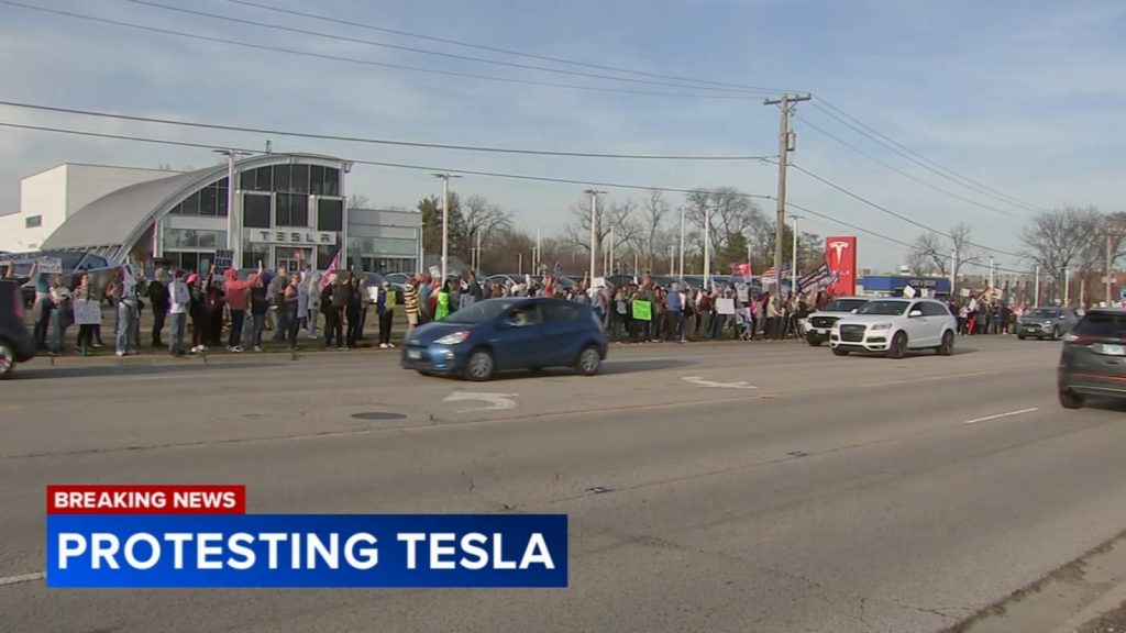 Group holds Lisle protest outside Tesla car dealership in opposition of Donald Trump, Elon Musk's DOGE cuts