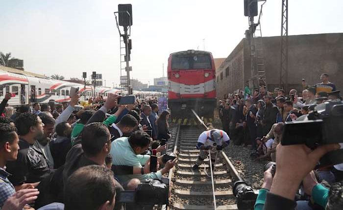 He can pull a train by the strength of his teeth. An Egyptian wrestler sets 3 world records
