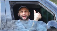 Kyle Walker looks high spirited as he returns home to Annie Kilner