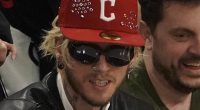Machine Gun Kelly cheers on the Cleveland Cavaliers as he enjoys a night out ahead of welcoming baby with ex Megan Fox