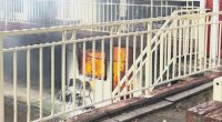 A man has been hurt in a fire at a motel near Brisbane.