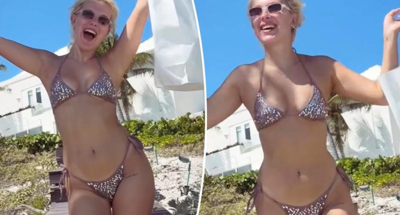 Millie Bobby Brown shows off thigh tattoo in sequined bikini on tropical vacation
