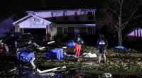 Large tornadoes are carving paths of destruction across the South for the second day in a row as a deadly storm system churns across the United States