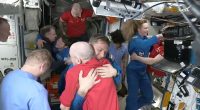 NASA's stuck astronauts welcome their newly arrived replacements to the space station