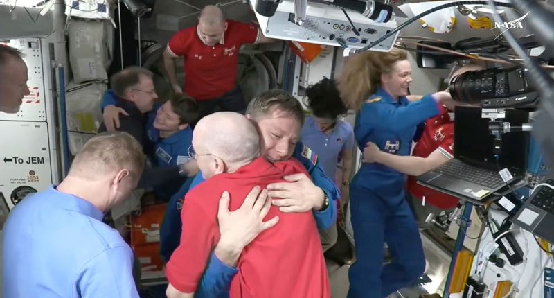 NASA's stuck astronauts welcome their newly arrived replacements to the space station