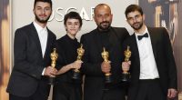 Basel Adra, from left, Rachel Szor, Hamdan Ballal, and Yuval Abraham, winners of the award for best documentary feature film for "No Other Land," pose in the press room at the Oscars on Sunday, March 2, 2025, at the Dolby Theatre in Los Angeles.