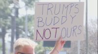Protestors gather outside Rep. Buddy Carters' office
