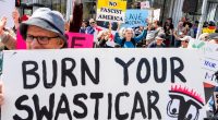 Protests against Elon Musk, DOGE swarm Tesla showrooms