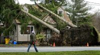 Residents pick up the pieces after devastating storms scour the US South and Midwest
