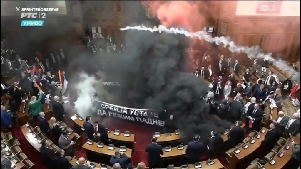 Serbia parliament smoke bombs, flares leave at least 3 lawmakers injured in Belgrade
