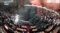 Serbia parliament smoke bombs, flares leave at least 3 lawmakers injured in Belgrade